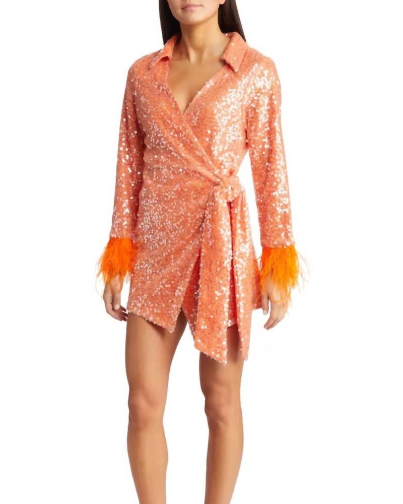 Front of a model wearing a size Large Fitz Sequin Wrap Mini Dress In Orange in Orange by AMYLYNN. | dia_product_style_image_id:347651